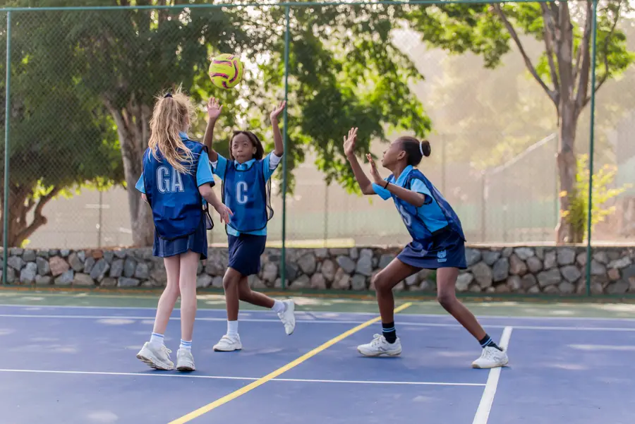Netball players on the outdoor courts