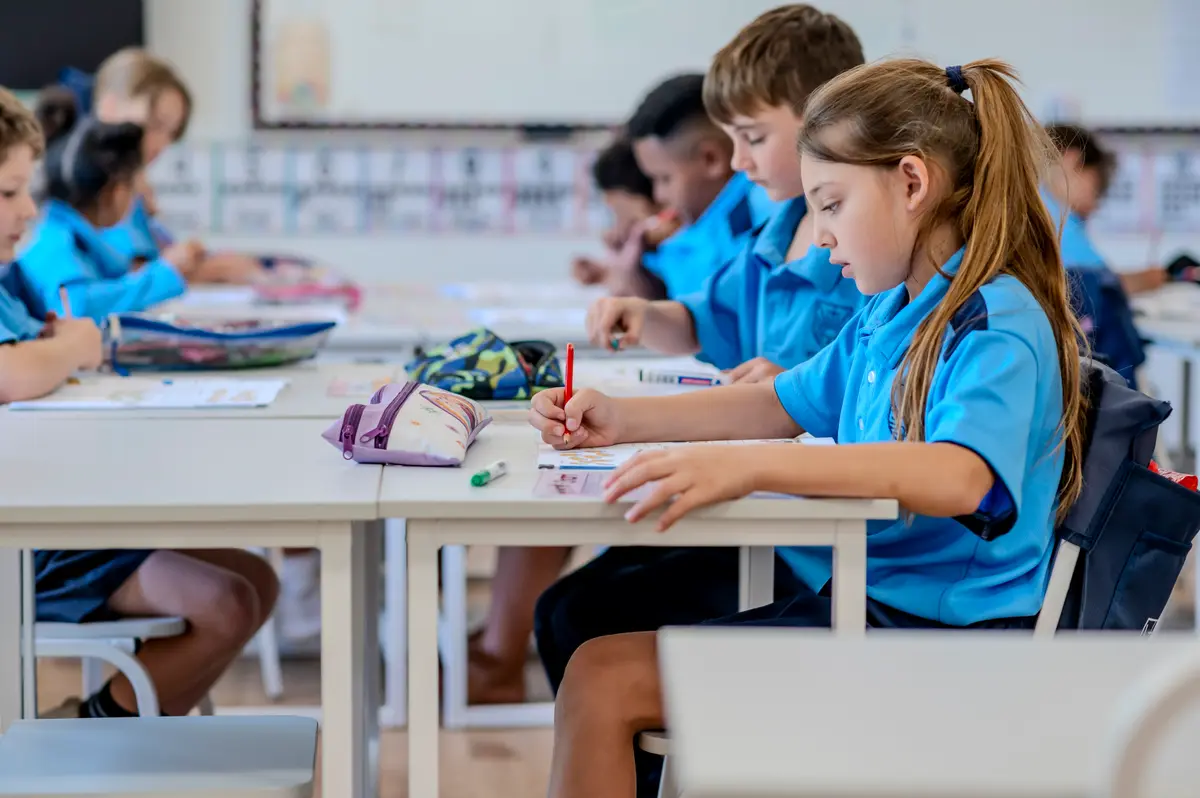 Preparatory School children concentrating on their work at classroom desks